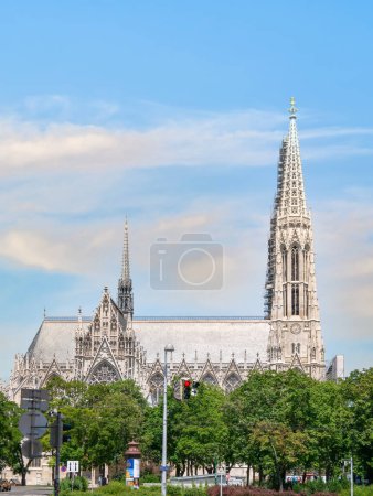 Photo for Vienna, Austria - June 2022: Side view with the neo-Gothic style church called Votivkirche, in Vienna - Royalty Free Image