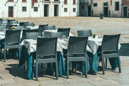 Foto de Pintoresca escena vintage con un restaurante al aire libre terraza cafetería en Venecia, Italia. - Imagen libre de derechos