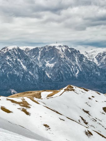 Photo for Scenic view from Baiului Mountains with the snowy peaks of Bucegi Mountains. Carpathians in Romania. - Royalty Free Image