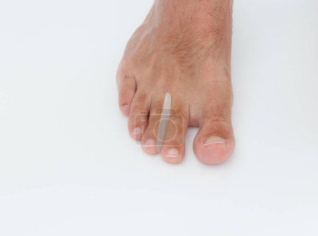 Foto de Separador de puntera de silicona para dedos de los pies rectos. - Imagen libre de derechos