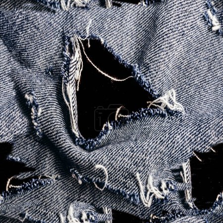 Photo for Seamless texture photo of light blue colored torn denim or jeans material. - Royalty Free Image