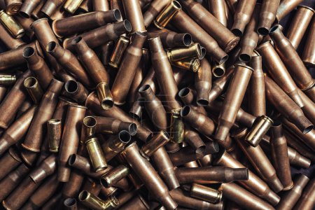 Photo for Photo of a pile of copper colored bullet shells texture. - Royalty Free Image