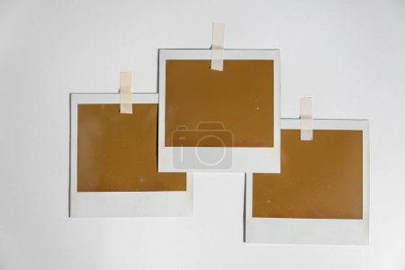 Photo for Three blank photo frames on white background. download photo - Royalty Free Image