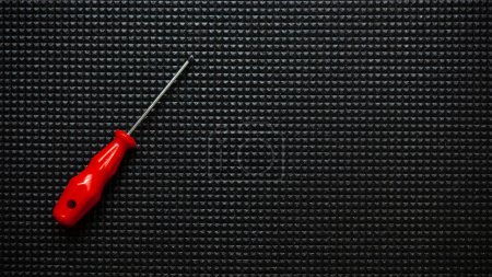 Photo for Red screwdrivers on black background. Work industrial concept - Royalty Free Image
