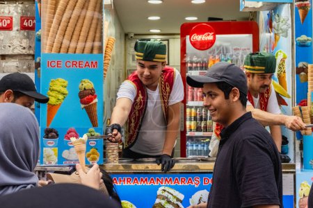 Photo for Beyoglu, ISTANBUL - June 20 2023: Istiklal ice cream dondurma seller. Turkey street food - Royalty Free Image