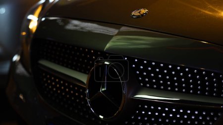 Photo for Istanbul/Turkey - 05.08.2023. Mercedes Benz star logo at night. Luxury car dramatic photo - Royalty Free Image