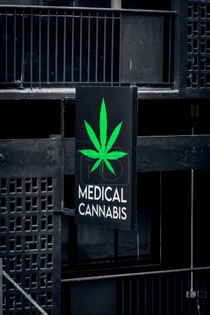 Photo for Close-up of a signboard at cannabis store. Marijuana banner outside the coffeeshop - Royalty Free Image