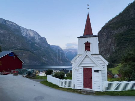 Photo for Autumn landscape in Wooden church of Undredal in south Norway - Royalty Free Image