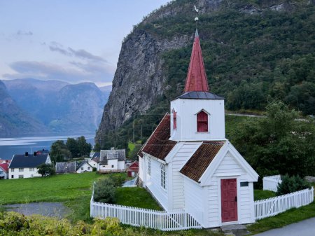 Photo for Autumn landscape in Wooden church of Undredal in south Norway - Royalty Free Image
