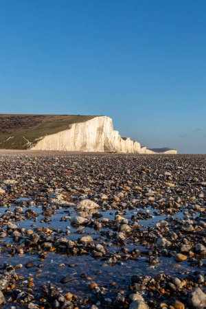Photo for Looking out from the pebble beach at Hope Gap, at the Seven Sisters Cliffs - Royalty Free Image