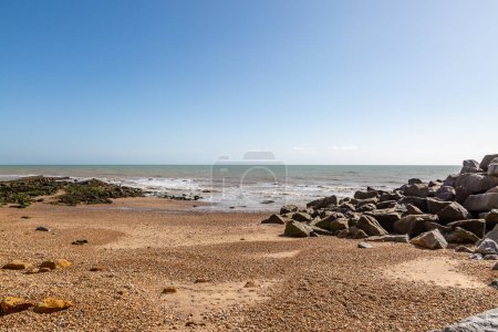 Photo for A Sussex coastal view near Pett Level, with a blue sky overhead - Royalty Free Image