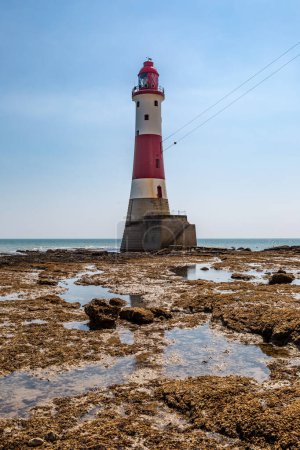 Beachy Head Lighthouse on the Sussex coast, taken from the beach at low tide