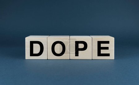 Photo for Dope. Cubes form the word Dope. A broad concept is the word Dope used both in sports, medicine and personal life. - Royalty Free Image