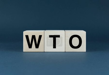 Téléchargez les photos : OMC - Organisation mondiale du commerce. Les cubes forment le mot OMC - Organisation mondiale du commerce. Concept des mots d'affaires Organisation mondiale du commerce - en image libre de droit