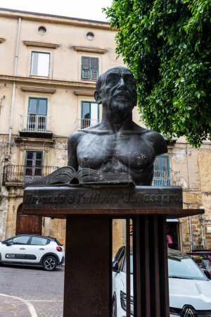 Photo for Agrigento, Italy - May 8, 2023: Statue of Luigi Pirandello in front of the Luigi Pirandello Theater in the old town of Agrigento, Sicily, Italy - Royalty Free Image