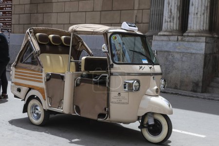 Photo for Palermo, Italy - May 13, 2023: Tricycle of the Piaggio brand that make tourist circuits parked on a street in the old town of Palermo, Sicily, Italy - Royalty Free Image