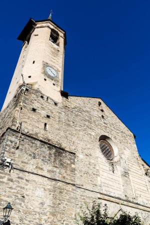 Bell tower of the church of Sant Vicenc of the rustic village of Esterri Aneu, Lleida, Catalonia, Spain