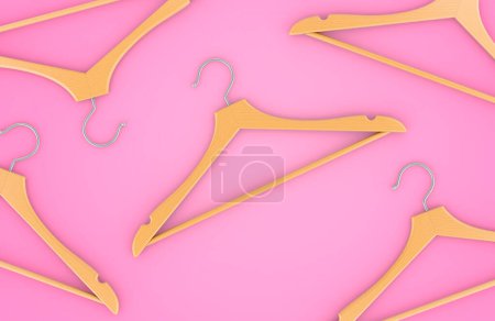Photo for Wood Hangers on the pink backdrop, top view. 3D rendering - Royalty Free Image