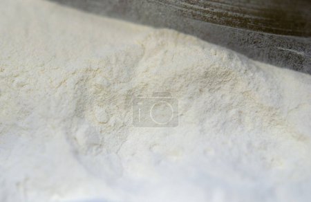 White polyamide powder close up. White polyamide powder for creating objects on 3D printer. Material polyamide powder for 3D printer printing. Additive MJF Multi Jet Fusion technologies. Thermoplastic