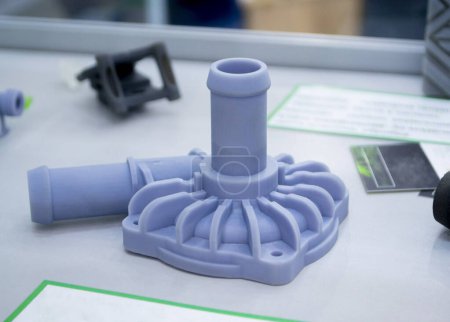 3D printed object from resin polymerization. Parts created on 3D printer from hardened resin. Details printed on 3D printer using SLA printing technology. New modern additive 3D printing technologies