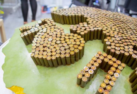 Object made up of spent used cartridge cases. Lots used shells from cartridge cases ammo close up. Model from Many Used cartridge Cases. Concept war military confrontation defense protection firearm