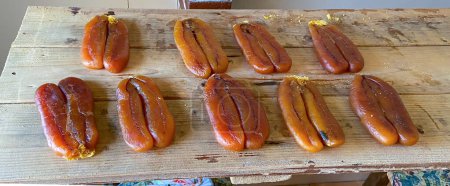 Foto de Bottarga, la corza seca y prensada del salmonete, utilizada en la cocina sarda - Imagen libre de derechos