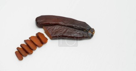 Foto de Bottarga, la corza seca y prensada del salmonete, utilizada en la cocina sarda - Imagen libre de derechos