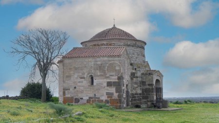 Nuraghe Santa Sabina in Silanus in central Sardinia with the church of Santa Serbana next to it