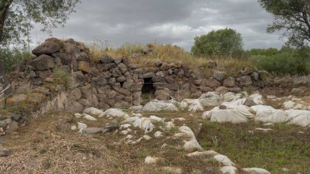 nuraghe in ruins during excavations