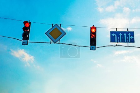 Photo for Traffic lights with red light on the highway against the background of the evening sky. highway - Royalty Free Image