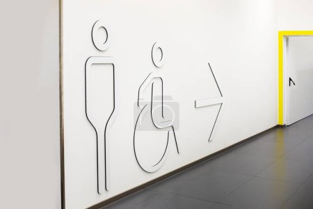 Photo for Entrance to the men's room and the toilet for people with special needs in the supermarket - Royalty Free Image