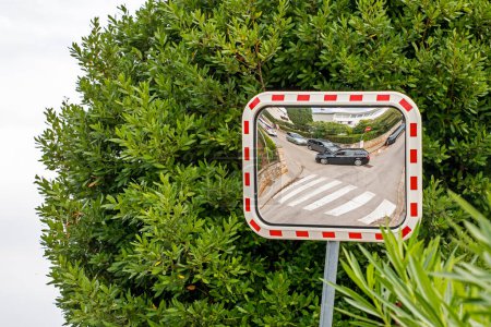 Photo for Road auxiliary mirror on the road during sharp turns for cars - Royalty Free Image