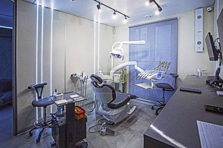 Photo for Dental office with modern technology for dental treatment. Dental care and treatment - Royalty Free Image