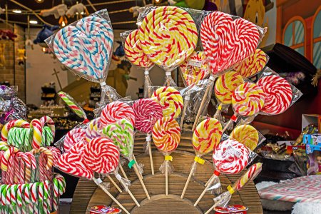 Photo for Colorful lollipops of different shapes on sticks in a store - Royalty Free Image