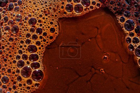abstract brown background with bubbles of hot natural chocolate