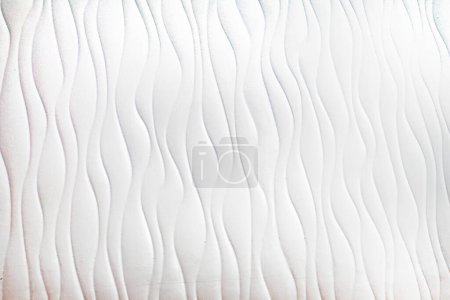 abstract textured light wall background in a modern interior