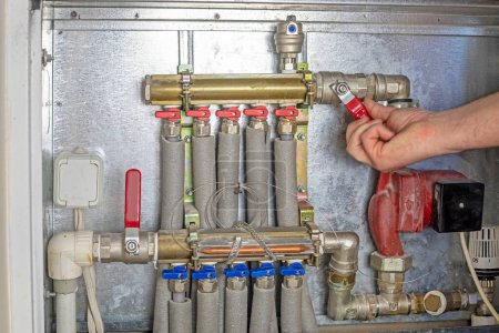 turn off the tap with cold and hot water in the house. Maintenance and inspection of home plumbing. Heat saving