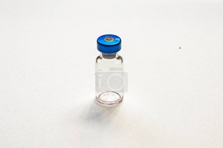 empty bottle with medicines for treatment and vaccinations on a white background. Routine vaccinations for animals and people