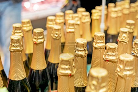 Photo for Packs of sparkling white and red wine in a supermarket. preparation for the holiday - Royalty Free Image