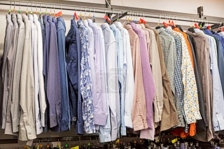 stylish modern men's raglans and sweaters in the supermarket