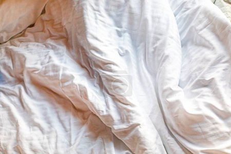 abstrakte strukturierte Licht Hintergrund der Bettbezug Stoff im Bett