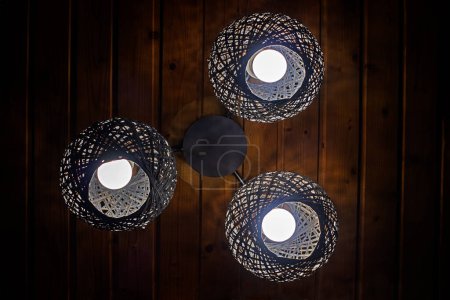 natural wall lamp woven from cattail. Eco design
