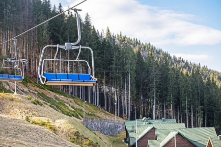 ski lift on a sunny day on a snowy slope. Leisure