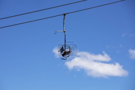 observation chair on a flat lift high in the sky. leisur