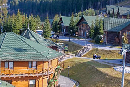 modern building complex in a mountainous area, a ski resort. Landscape design