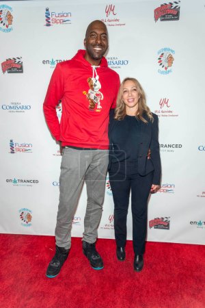 Photo for John Salley with Gloria Irizarry attends 2022 American Music Awards Celebrity Gifting Suite by Steve Mitchell MTG at Woma's Club of Hollywood, Los Angeles, CA, November 19th 2022 - Royalty Free Image
