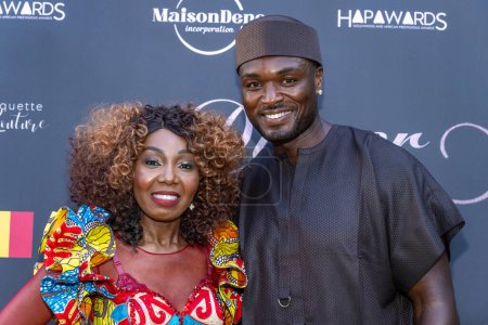 Foto de Health4Peace Founder and CEO Nathalie Beasnael, Actor Zimzon Zion Lelo attend Black-Tie Dinner Party In Honor of Her Excellency Kitoko Gata Ngoulou, Ambassador of Chad at home of Phil Westbrooks, Los Angeles, CA July 21, 2023 - Imagen libre de derechos