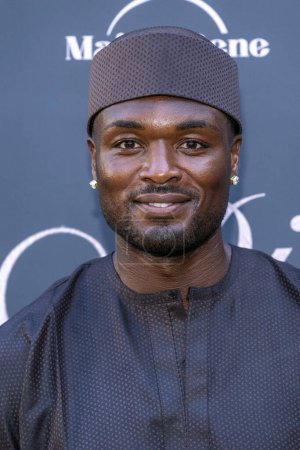 Foto de Actor Zimzon Zion Lelo attends Black-Tie Dinner Party In Honor of Her Excellency Kitoko Gata Ngoulou, Ambassador of Chad at home of Phil Westbrooks, Los Angeles, CA July 21, 2023 - Imagen libre de derechos