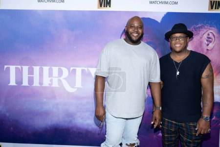 Photo for Director Anthony Bawn, Co-Writer Dr. Donta Morrison attend LA Premiere Director Anthony Bawn TV Series THIRTY at Cinemark Baldwin Hills, Los Angeles, CA July 26, 2023 - Royalty Free Image