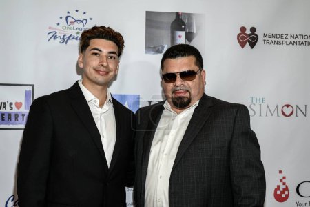Téléchargez les photos : Récepteur de transplantation cardiaque Ricky Oropeza avec son fils Freddy assiste au gala annuel du prix OneLegacy Ava's Heart au Taglyan Complex, Los Angeles, CA 24 août 2023 - en image libre de droit